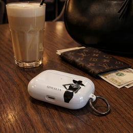 AirPods Case — Elegant Black Hat Silhouette with 'ADRALIA' Text