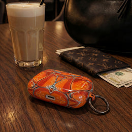 Orange Abstract Pattern AirPod Case — Vibrant Geometric Protective Cover